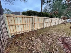 A 6 foot tall board on board wood privacy fence. This provides 100% full coverage with no visible gaps.