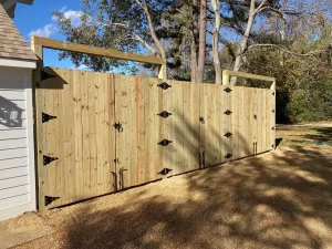 Two 8 foot tall wood double drive gates for boats.