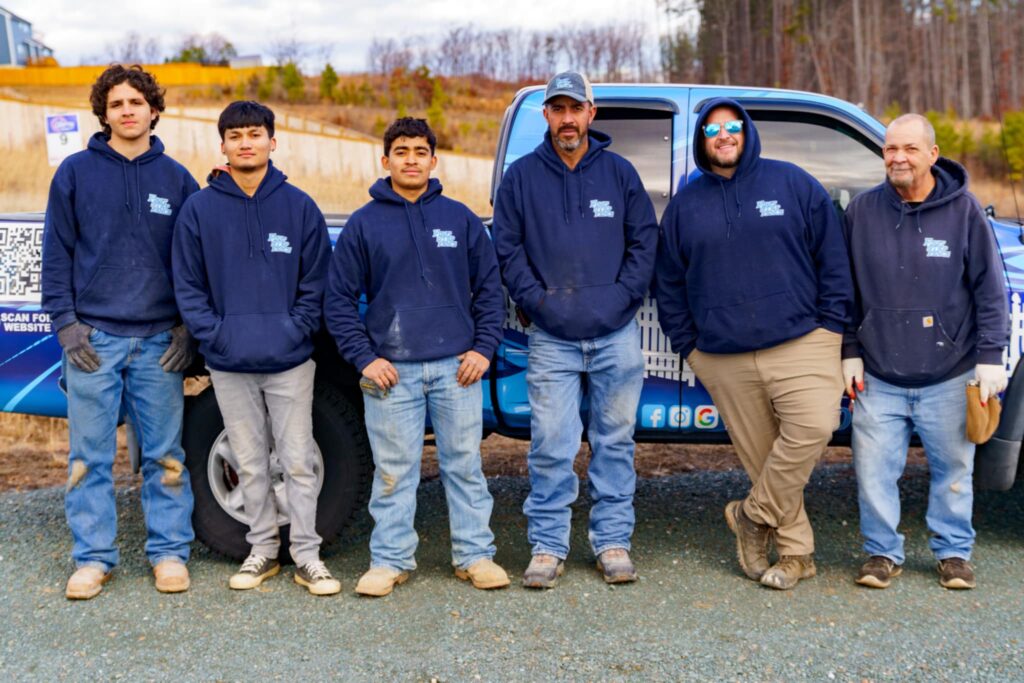 A photo of the First Step Fence team.